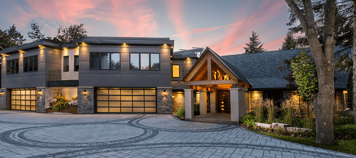 Modern glass garage doors on luxury home